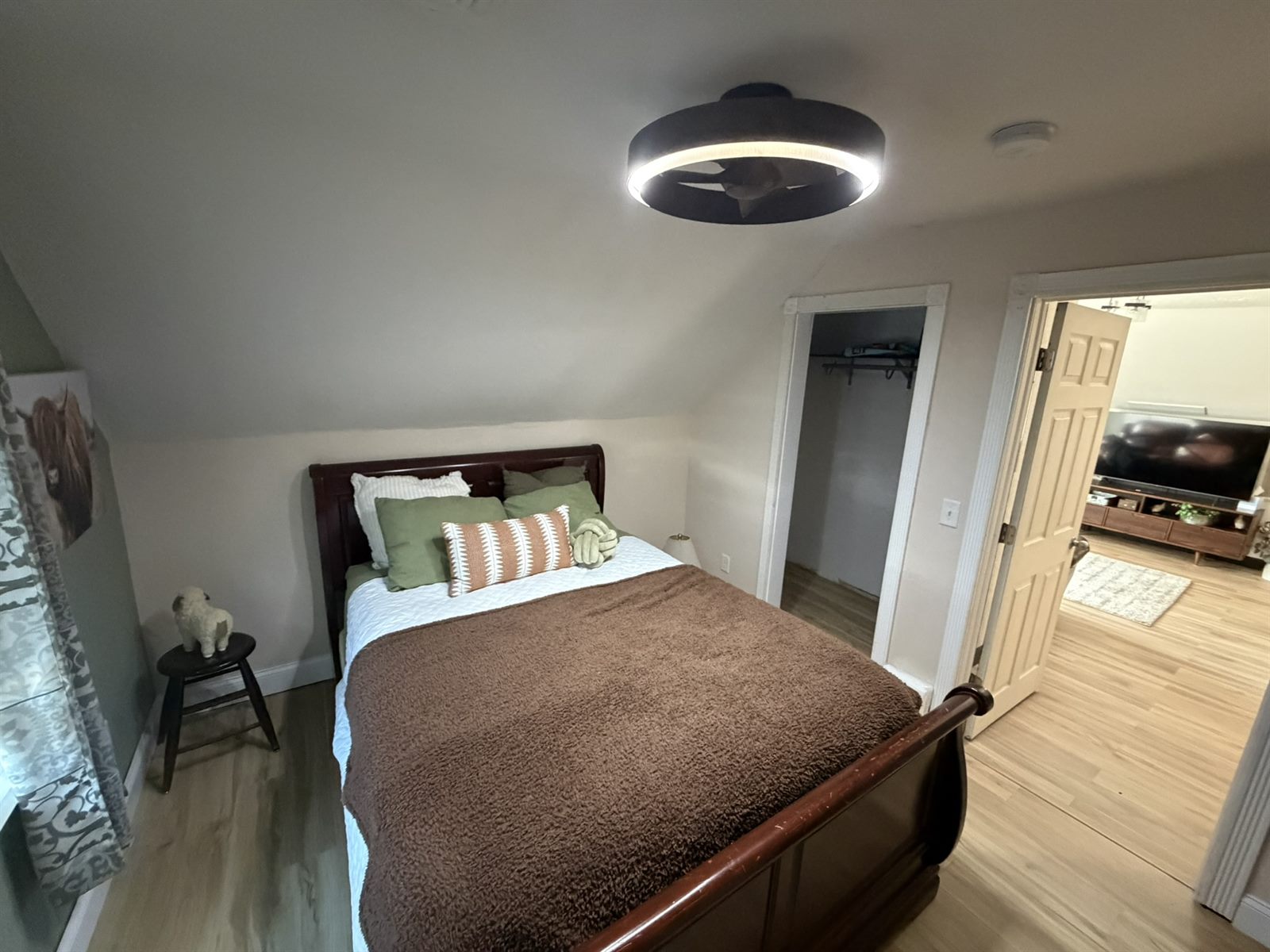 Bedroom in Rose's Barn Loft open to the living space