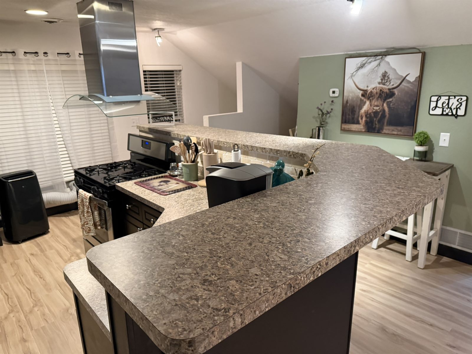 Gas range and prep island in Rose's Barn Loft