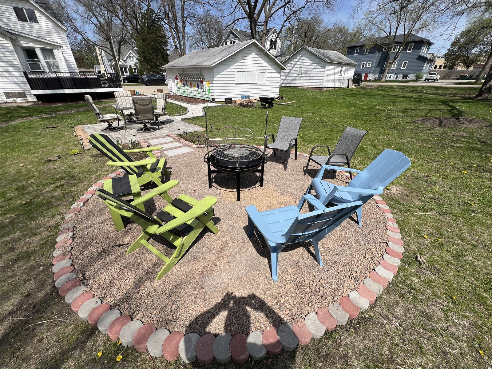 Shared fire pit and Adirondack seating at 816 E Center Street