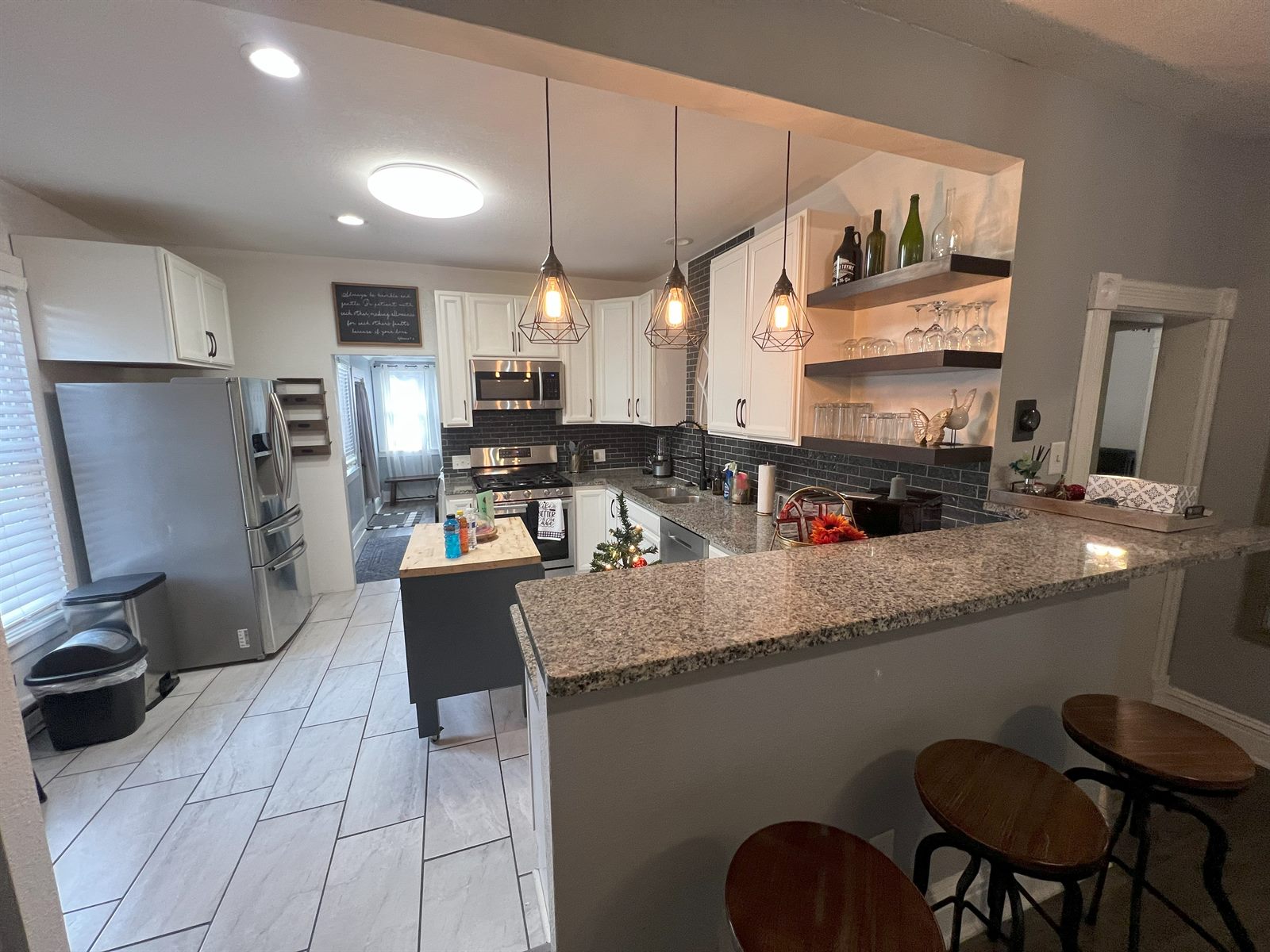 Rose's Place kitchen with a butcher-block island and seating