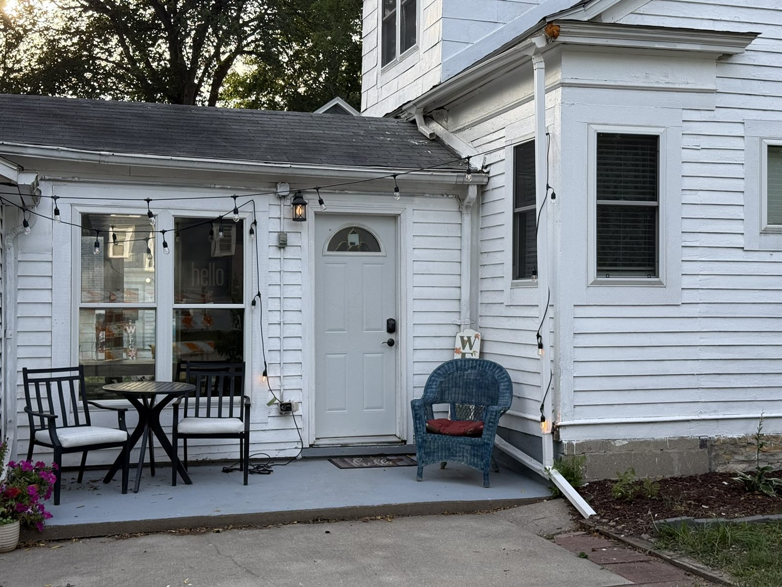 Covered front porch at Rose’s Village
